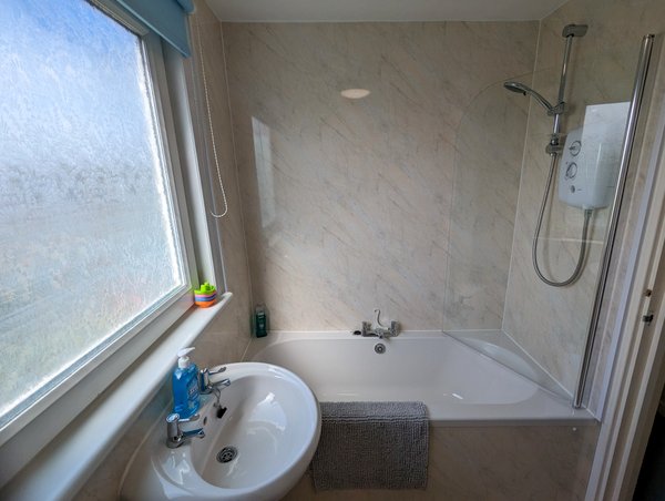 Upstairs Bathroom with shower